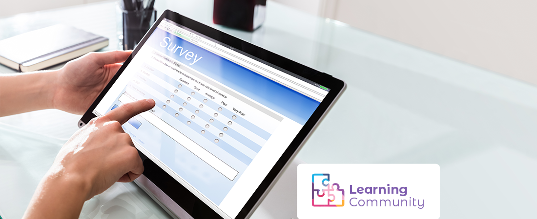 Image of a person filling out a survey, with the Learning Community logo