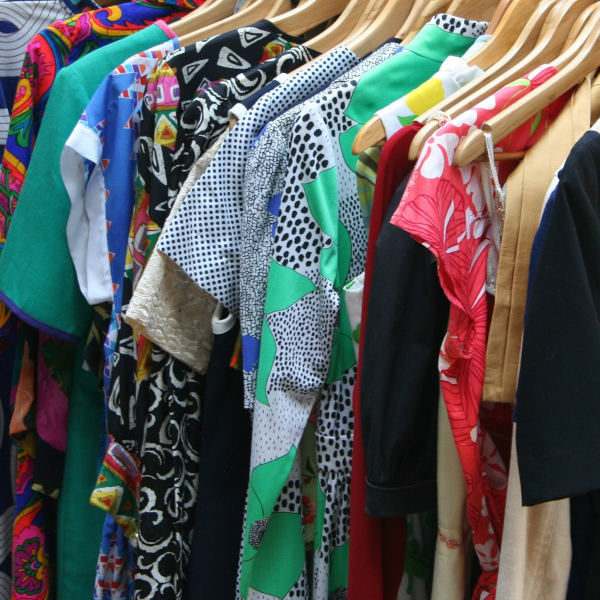 Second-hand clothes hanging on a rail