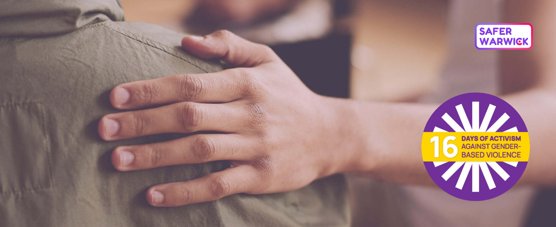 Image of a hand on someones shoulder comforting them